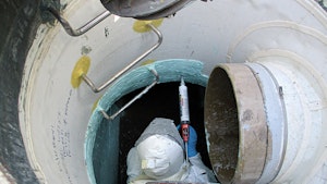 Epoxy and adhesive provide transition between T-Lock and concrete manhole