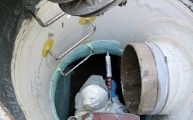 Epoxy and adhesive provide transition between T-Lock and concrete manhole